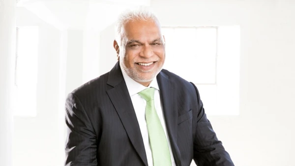 Dentist Upland CA Hemant Patel HP ABout A professional photo of Dr. Hemant Patel wearing a suit and tie